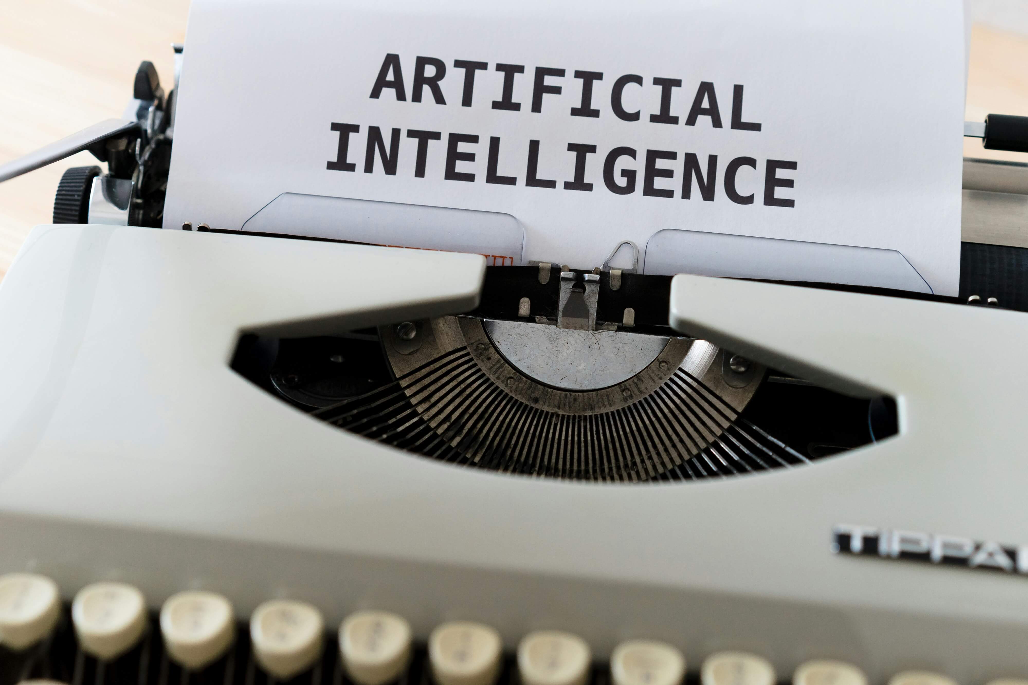 Typewriter with the words Artificial Intelligence printed